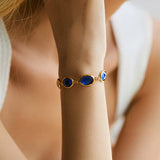Pulseira Dourada Encantadora de Pedra Azul