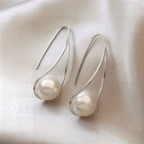 Brincos Místicos de Pérolas Elegantes