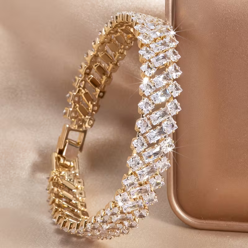 Pulseira Luxuosa de Ouro e Esmeralda Elegante